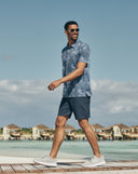 Travis Mathew Men's Featherweight Reservation Blue Horizon Golf Polo